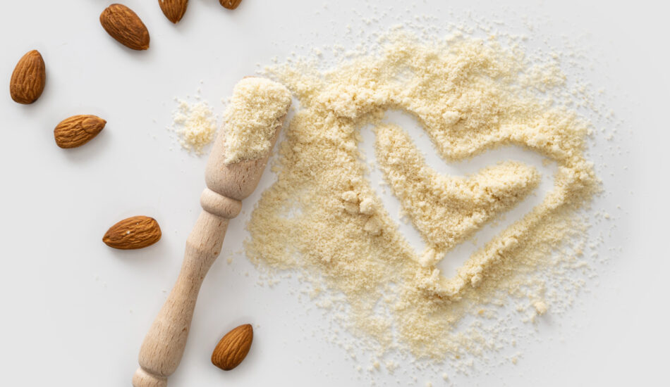 Banner,,Almond,Flour,With,Nuts,Scattered,On,White,Background,,Love